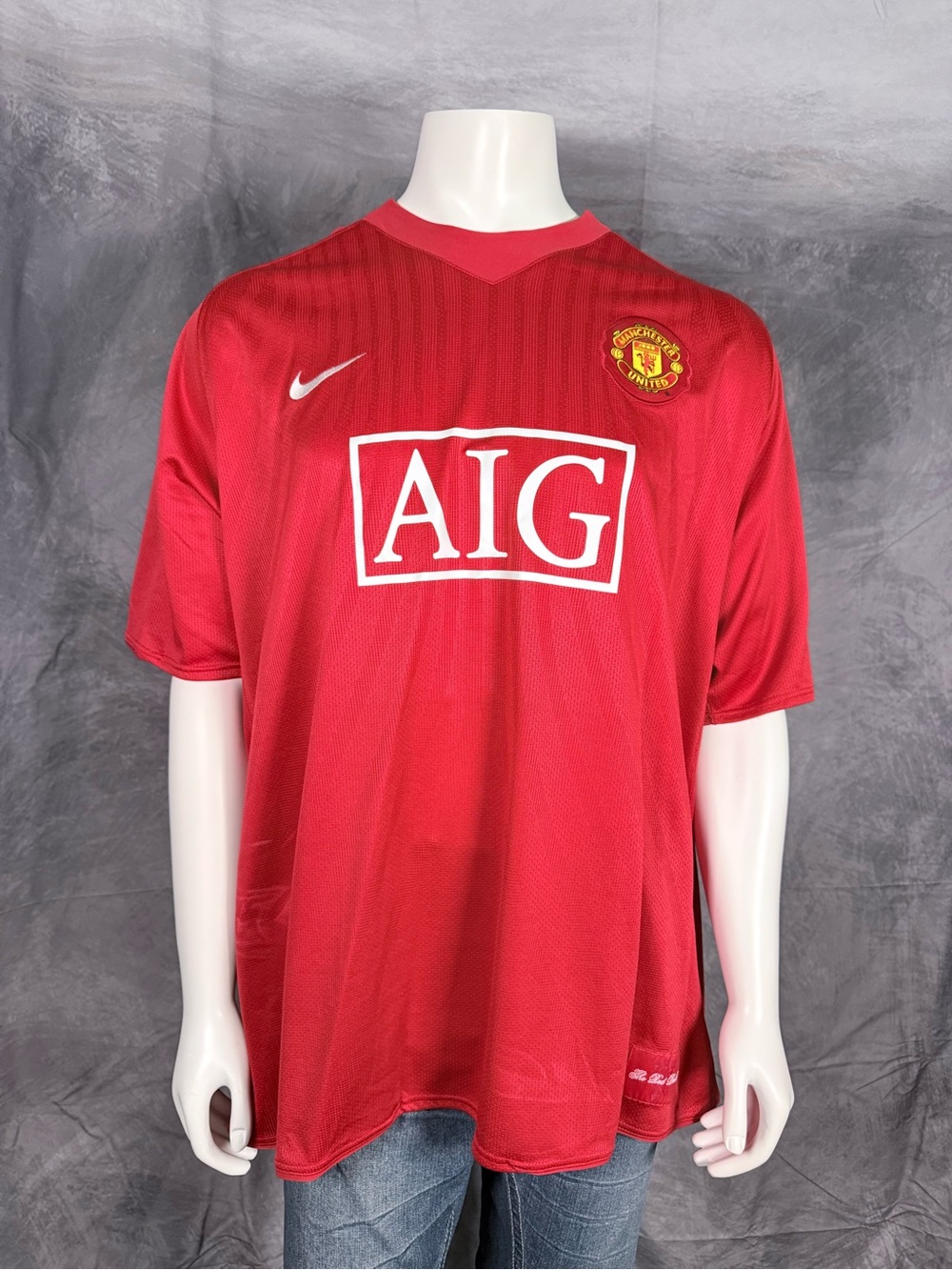 Nike Men’s Red AIG Manchester United Football Jersey